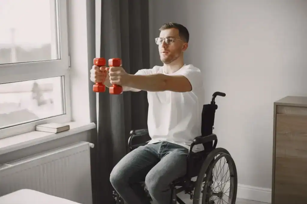 Image of man doing exercise in his wheelchair to aid weight loss  East Sussex