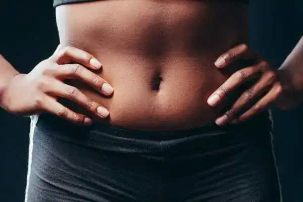 Toning Your Stomach: The Ultimate Guide to Achieving a Sculpted Stomach While Shedding Pounds 1 Image of a toned stomach after non surgical treatment East Sussex